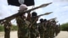 Al-Shabaab militants parading at a training camp south of Mogadishu.