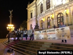 Во время акции протеста в Праге 19 сентября 2018 года против выступления пианистки Валентины Лисицы
