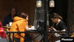 Armenia -- Customers at a cafe in Yerevan, May 4, 2020.