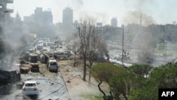 Сирия -- Автомашинага коюлган бомба жардыруусунан кийин. Дамаск, 21-февраль, 2013.