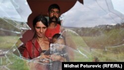 Midhat Poturovic's photograph "Violence Against Roma People" 