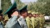 Tajik guards stand at attention during the official opening of a new Tajik-Afghan border post, which has been funded by the U.S. State Department. (courtesy of the Bureau of International Narcotics and Law Enforcement Affairs - U.S. State Dept.)