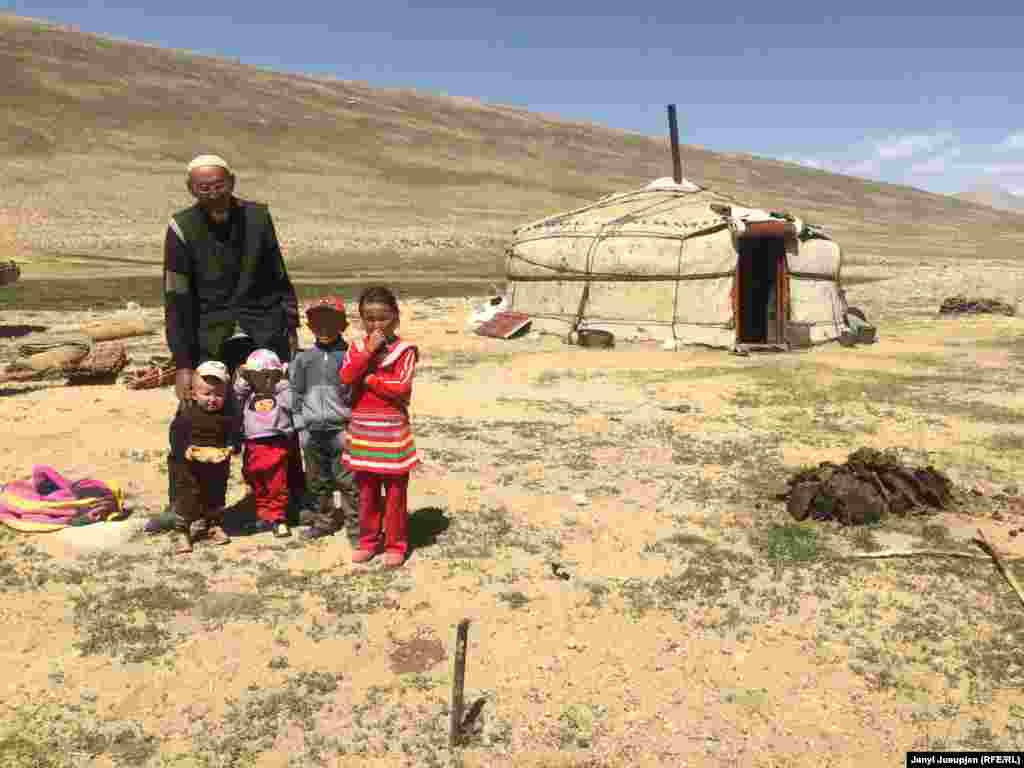 Tagaybek Turdukulov with his grandchildren. Turdukulov was a Komsomol leader in Soviet times, and in the 1990s he was responsible for privatization: distributing yaks and sheep to former workers of state farms.