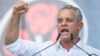 Vladimir Plahotniuc gestures as he addresses a political rally in Chisinau on June 9, 2019, just before he fled the country.