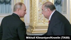 Россия президенти Владимир Путин ва миллиардер Алишер Усмонов