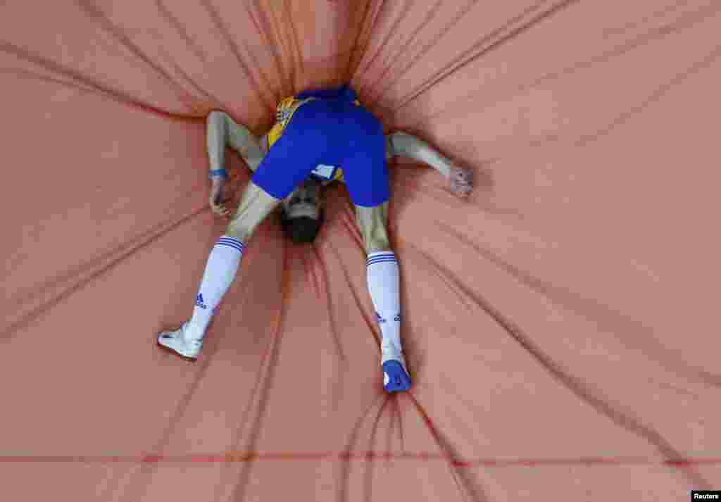 Alexandru Tufa of Romania competes during the men's high jump qualification event at the European Athletics Indoor Championships in Sweden on March 1. (Reuters/Pawel Kopczynski)