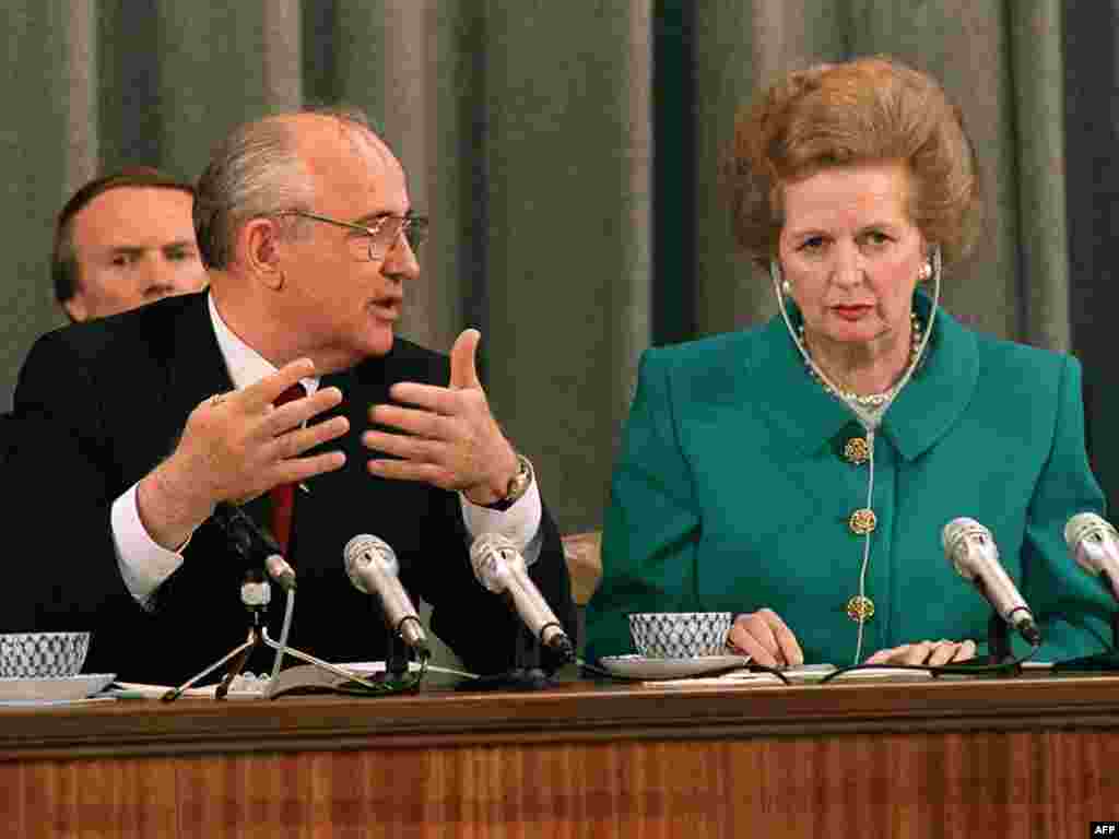 Soviet President Mikhail Gorbachev talks to Bristish Prime Minister Margaret Thatcher during their joint press conference in Moscow in June 1990.