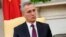 NATO Secretary General Jens Stoltenberg listens while meeting with U.S. President Donald Trump in the Oval Office at the White House in Washington on April 2.
