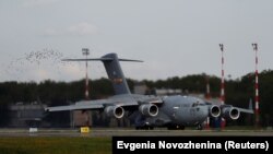 A U.S. Air Force transport plane, carrying the first batch of medical aid from the United States, lands at Vnukovo International Airport in Moscow on May 21.