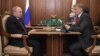 Russian President Vladimir Putin (left) speaks with Sberbank CEO German Gref during a meeting in Moscow in September 2019.