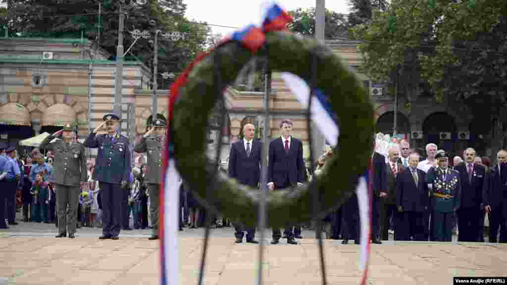 Serbian politicians and army officers attend a Victory Day ceremony in Belgrade. 