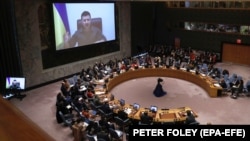 Ukrainian President Volodymyr Zelenskiy addresses the UN Security Council via video link during a meeting at UN headquarters in New York on April 5, 2022.