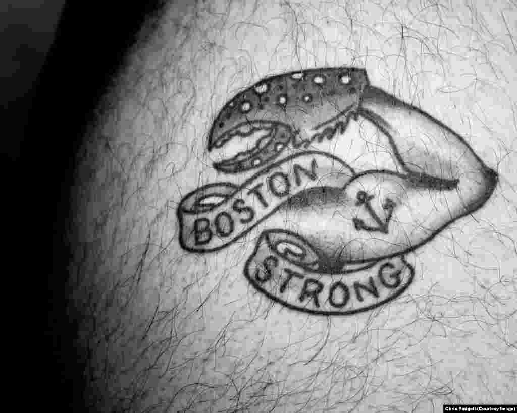 Paul&rsquo;s tattoo, with a claw from a local lobster, shows off the Bostonian sense of humor.
