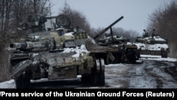 Destroyed Russian tanks are seen in the northeastern Sumy region of Ukraine last month.