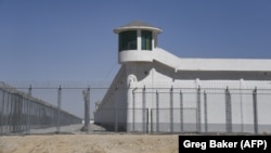 A watchtower on a high-security facility near what is believed to be a camp where mostly Muslim ethnic minorities are detained in China.