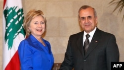 Lebanese President Michel Sleiman shakes hands with U.S. Secretary of State Hillary Clinton during a meeting in Baabda, east of Beirut.