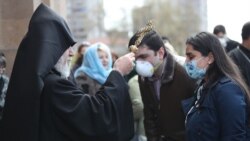 Armenia -- Catholicos Garegin II blesses believers after holding an Easter Mass at St. Gregory the Illuminator's Cathedral, Yerevan, April 12, 2020.