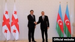 Georgian President Mikheil Saakashvili (left) and his Azerbaijani counterpart, Ilham Aliyev, met in Baku in March 2012.