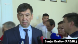 Bishkek's new mayor, Aziz Surakmatov speaking to reporters on August 8. 