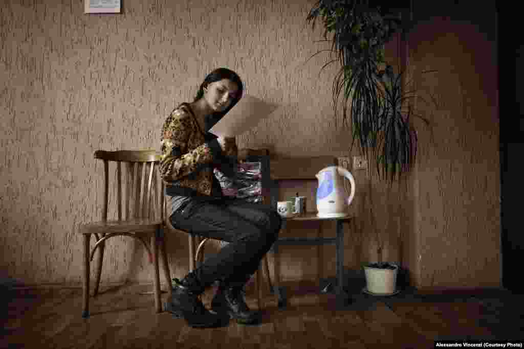 Ania, 14, studies for a music performance. Ania chose to attend the lyceum, and hopes to study art or languages abroad.