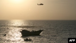 A U.S. Navy photograph of the U.S. operation to free the 13 Iranian sailors from captivity by pirates in the northern Arabian Sea on January 5.