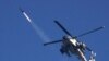 Израильский вертолет выпускает ракету над городом Бейт-Лахия, сектор Газа