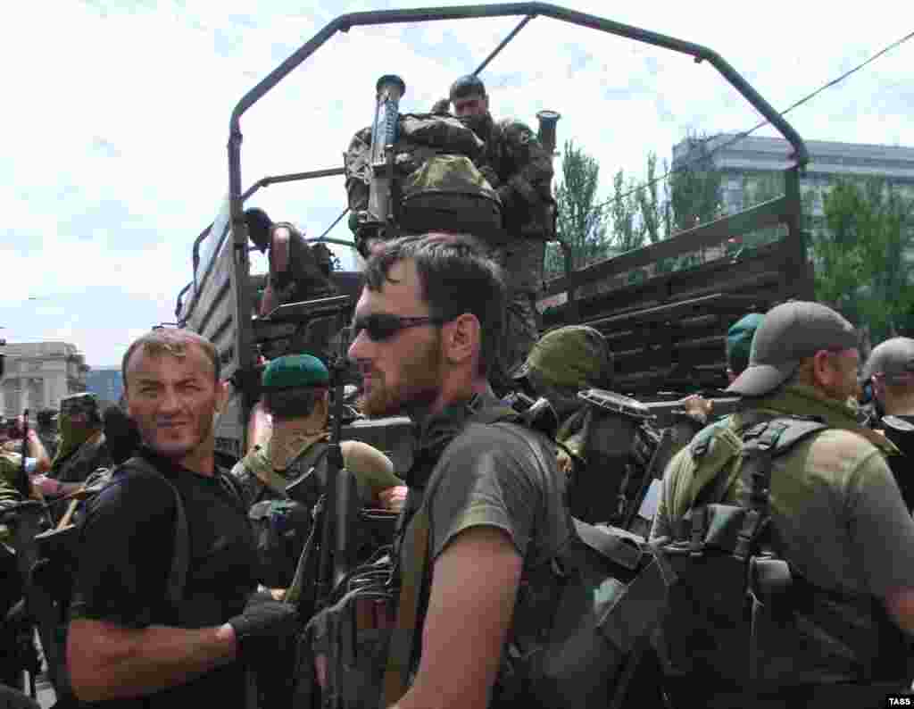 Volunteers recruited from Russia participating in a parade and demonstration in Donetsk on May 25.