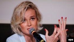 Polina Gagarina speaks at a press conference in Moscow in 2015 ahead of representing Russia at the Eurovision Song Contest.
