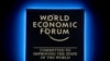 A Forum's logo shines during the annual meeting of the World Economic Forum in Davos, January 23, 2018