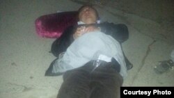 Избитый неизвестными адвокат Икрамидин Айткулов. Фото взято с профиля Хансара Айткулова в Фейсбуке. 13 ноября 2013 года