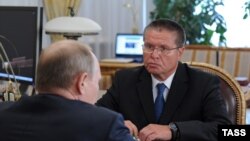 Алексей Улюкаев во время встречи с президентом России Владимиром Путиным. 2013 год.