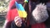 Девочка с украинской символикой на акции в честь 201-летия с Дня рождения Тараса Шевченко. Симферополь, 9 марта 2015 года