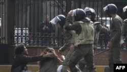 Security forces clashed with protesters near Cairo's Tahrir Square on December 16.