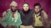 Chechen militant Abdulmalik Magomadov, aka Abu Umar Grozny, (center) is a member of the Islamic State's North Caucasus battalion Katibat al-Aqsa.