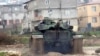 A Turkish Army tank moves toward the Syrian border in Reyhanlı on January 18.