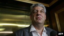 Mihai Tudose speaks to the media after was designated as the new prime minister at the parliament in Bucharest in June.