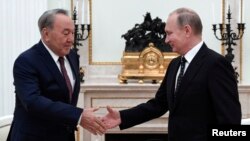 Президент Казахстана Нурсултан Назарбаев и президент России Владимир Путин (архивное фото)