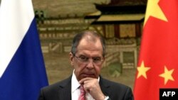 Russian Foreign Minister Sergei Lavrov's April 15 visit will come two days ahead of planned four-way talks between diplomats from Ukraine, Russia, the United States, and the European Union. 