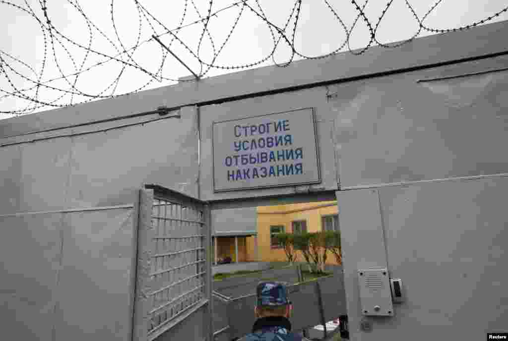 An officer enters a zone where especially strict conditions are imposed inside a high-security male prison camp