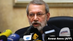 Iranian Parliament Speaker Ali Larijani gives a press conference at the Iranian embassy in the Lebanese capital Beirut, February 17, 2020