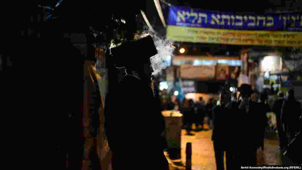 After the prayers Hasidics walk out in the streets of Uman.