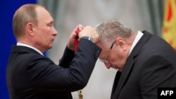 Russian President Vladimir Putin (left) awards lawmaker Vladimir Zhirinovsky during a ceremony at the Kremlin in Moscow in September.