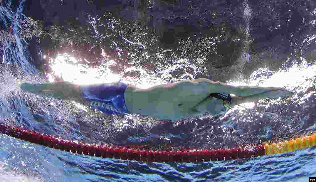 U.S. swimmer Michael Phelps competes in the men's 200-meter individual medley semifinal.