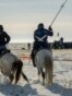 Two locals on horseback arrive at the Soyuz MS-13 spacecraft shortly after it landed in a remote area near the Kazakh town of Jezkazgan on February 6.&nbsp;