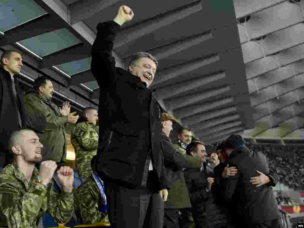 Ukrainian President Petro Poroshenko reacts during Dynamo Kyiv's Europa League victory over Everton at the Olympic Stadium in the Ukrainian capital on March 19. (epa/Mykola Lazarenko)