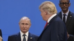 ABŞ prezidenti Donald Tramp və Rusiya prezidenti Vladimir Putin Buenos-Ayresdə G20 Sammitinin rəsmi foto çəkilişi zamanı. 2018