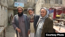 Mohammad Isaq (center), head of the Union for Afghanistan's Disabled, in Kabul