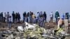 Եթովպիա - Ոստիկանները և փրկարարները օդանավի կործանման վայրում, 11-ը մարտի, 2019թ.