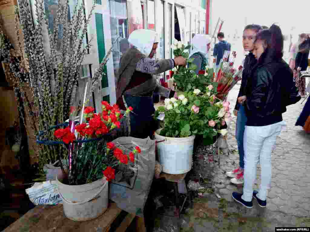 A florist sells roses in Turkmenabat, Turkmenistan.