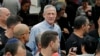 Retired Israeli general Benny Gantz (C), mingles with people during an electoral campaign tour, in the city of Rishon Letzion, south of the coastal city of Tel Aviv, on February 1, 2019. 